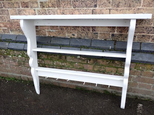 A PAINTED KITCHEN WALL RACK