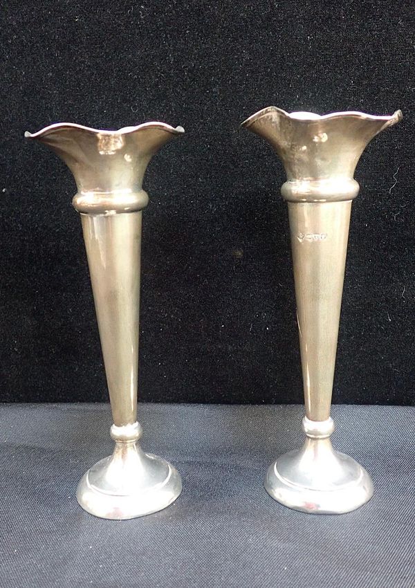 A PAIR OF SILVER FLOWER VASES