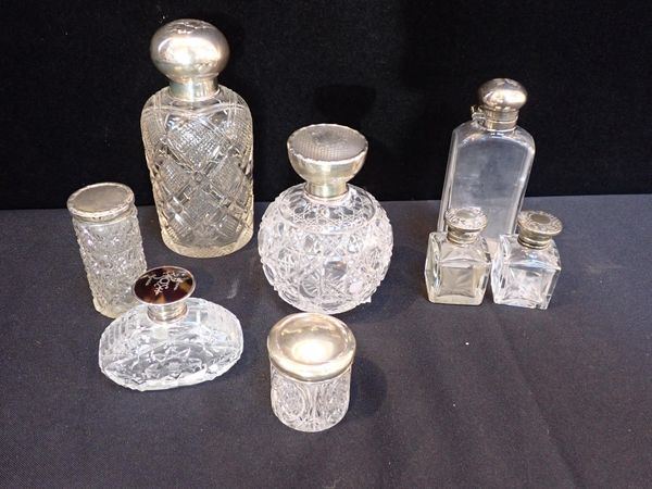 A SILVER-TOPPED HOBNAIL CUT GLASS PERFUME BOTTLE