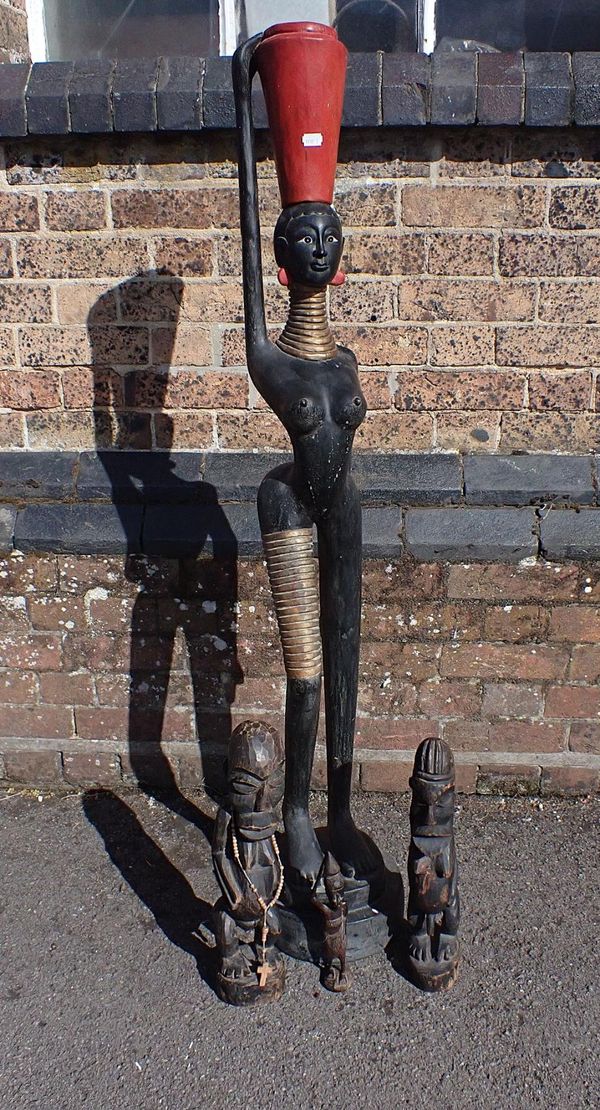 CARVED WOOD FIGURE OF AN AFRICAN WOMAN