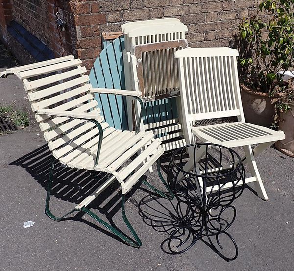 AN EDWARDIAN GARDEN ARMCHAIR WITH WROUGHT IRON FRAME