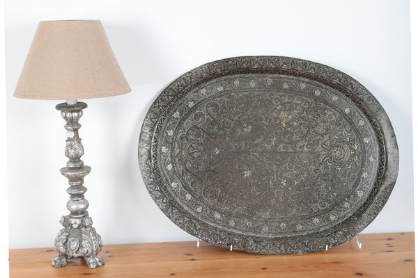 A SILVERED AND CARVED WOOD ELECTRIC TABLE LAMP