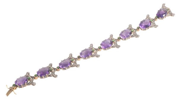 AN ART NOUVEAU STYLE AMETHYST,  GARNET AND DIAMOND BRACELET