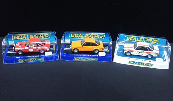 THREE BOXED SCALEXTRIC 'FORD ESCORT MK2' CARS