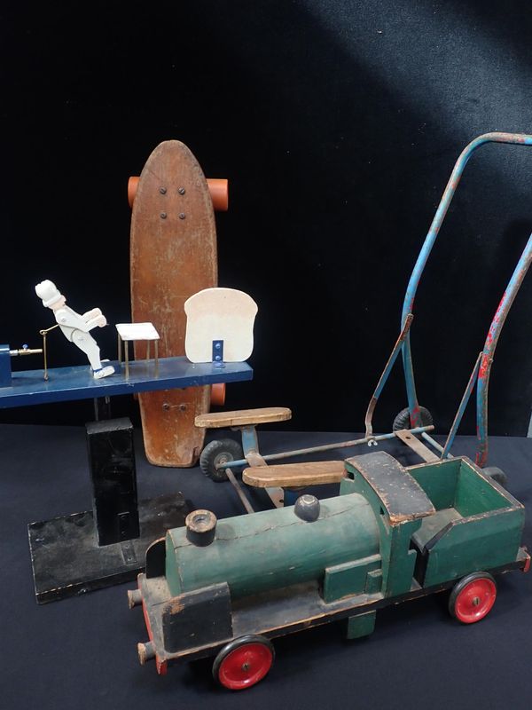 A SCRATCH BUILT WOODEN TOY TRAIN LOCOMOTIVE