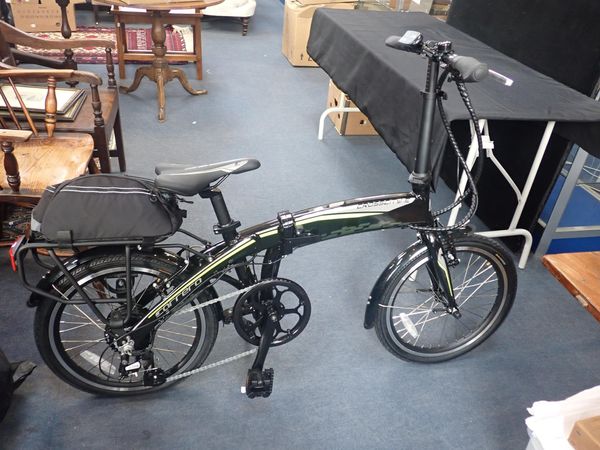 A CARRERA CROSSCITY FOLDING ELECTRIC BIKE