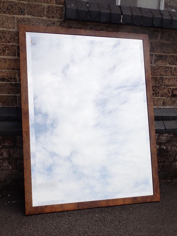 A LARGE WALL MIRROR WITH BIRD'S-EYE MAPLE FRAME