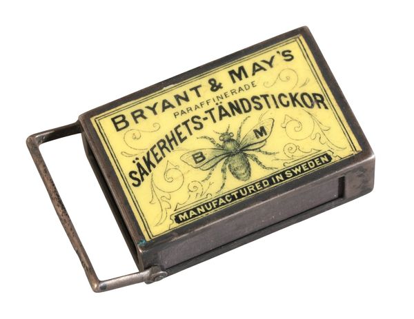 A LATE VICTORIAN ENAMELLED SILVER ‘BRYANT & MAY’ NOVELTY ADVERTISING MATCHBOX HOLDER