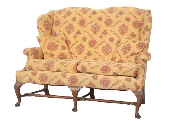 A QUEEN ANNE STYLE CAMEL BACK LOVE SEAT