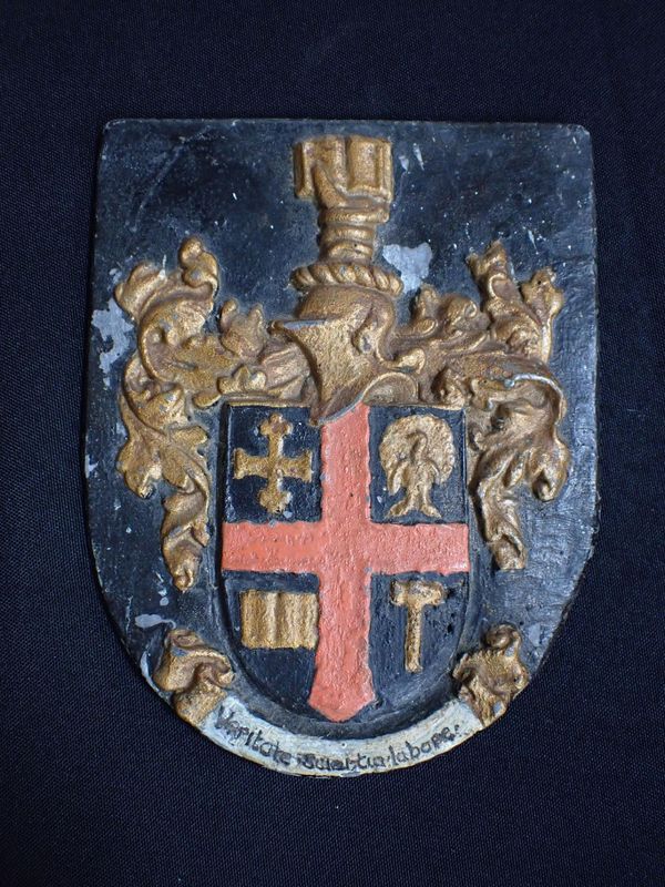 A CAST LEAD ARMORIAL PLAQUE