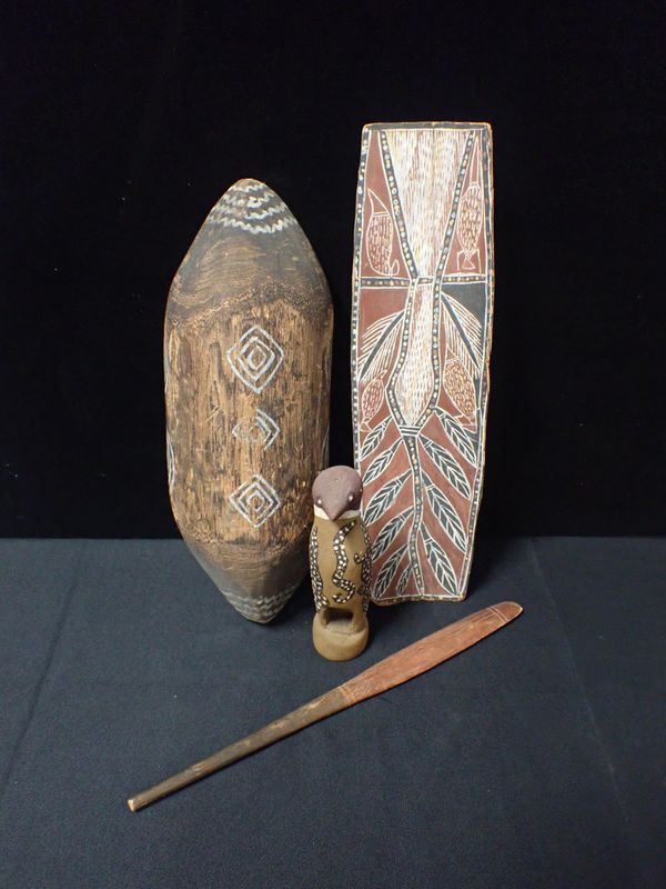 FOUR AUSTRALIAN CARVED AND WOODEN ARTEFACTS