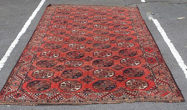 AN ANTIQUE BELUCH RUG OF TURKMEN DESIGN