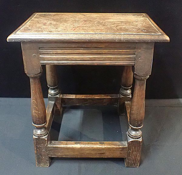 AN OAK JOINT STOOL