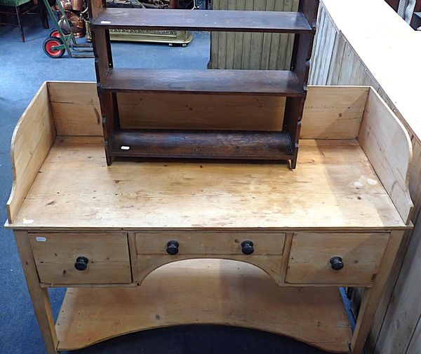 A 19th CENTURY STRIPPED PINE WASHSTAND