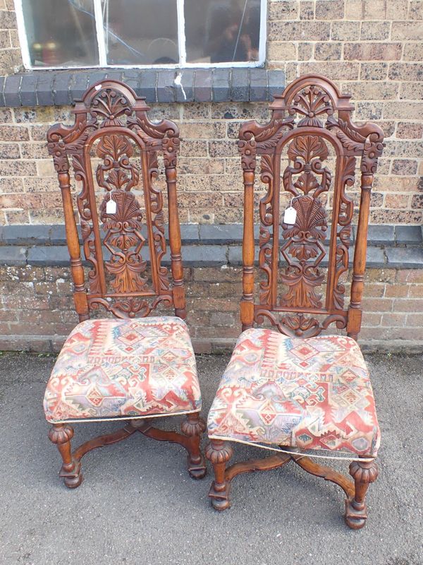 A PAIR OF VICTORIAN OAK HALL CHAIRS