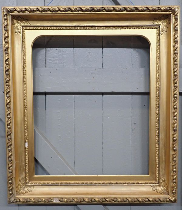 A  LARGE 19TH CENTURY GILT GESSO PICTURE FRAME