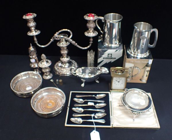 A PAIR OF SILVER-PLATED ON COPPER BOTTLE COASTERS