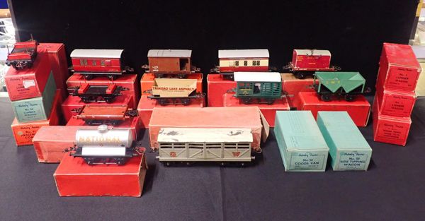 A COLLECTION OF BOXED HORNBY 0 GAUGE GOODS WAGONS AND COACHES