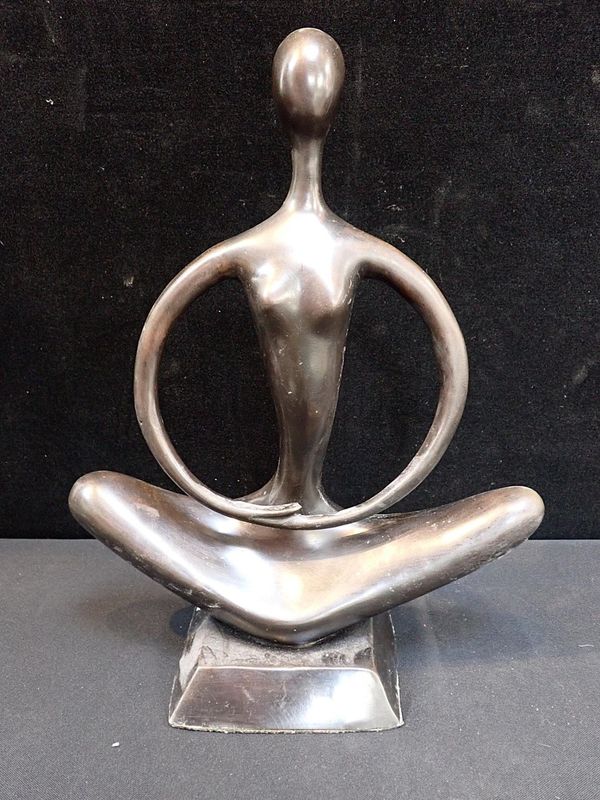A MODERN BRONZE FIGURE OF A WOMAN SITTING IN A MEDITATIVE POSE