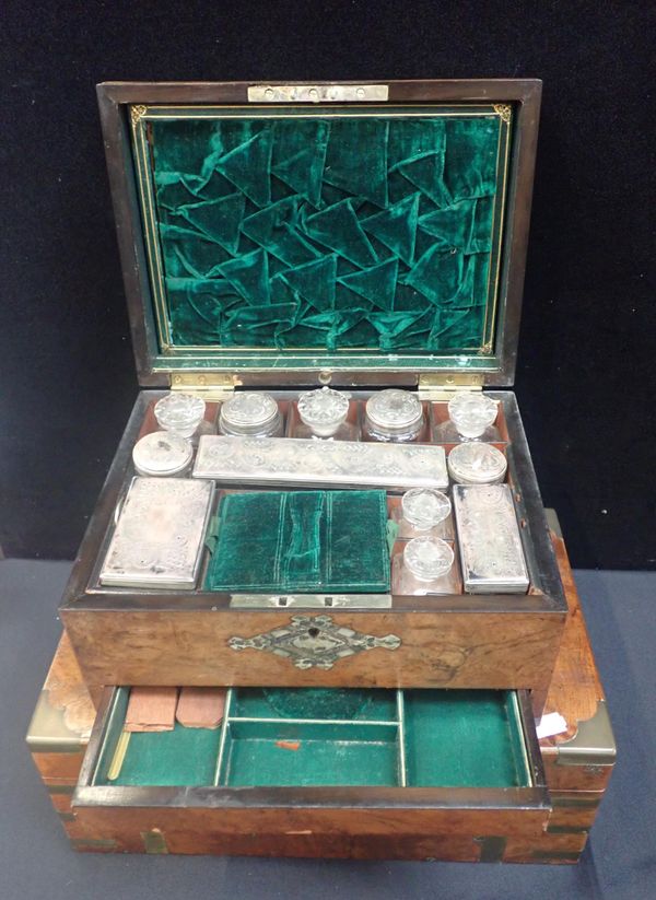 A VICTORIAN FIGURED WALNUT DRESSING CASE