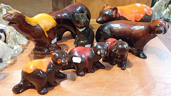 A GROUP OF ORANGE LAVA WARE CERAMIC BEARS