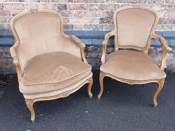 TWO MATCHING FRENCH BEECH-FRAMED ARMCHAIRS