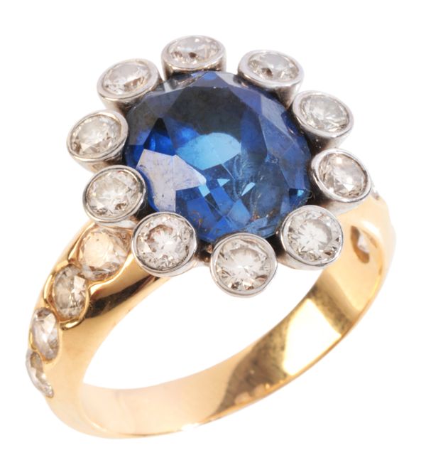 A SYNTHETIC SAPPHIRE AND DIAMOND CLUSTER RING