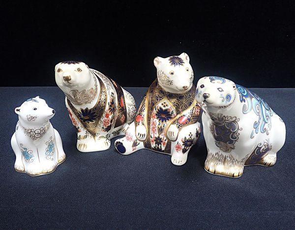 A GROUP OF FOUR ROYAL CROWN DERBY PORCELAIN POLAR BEARS