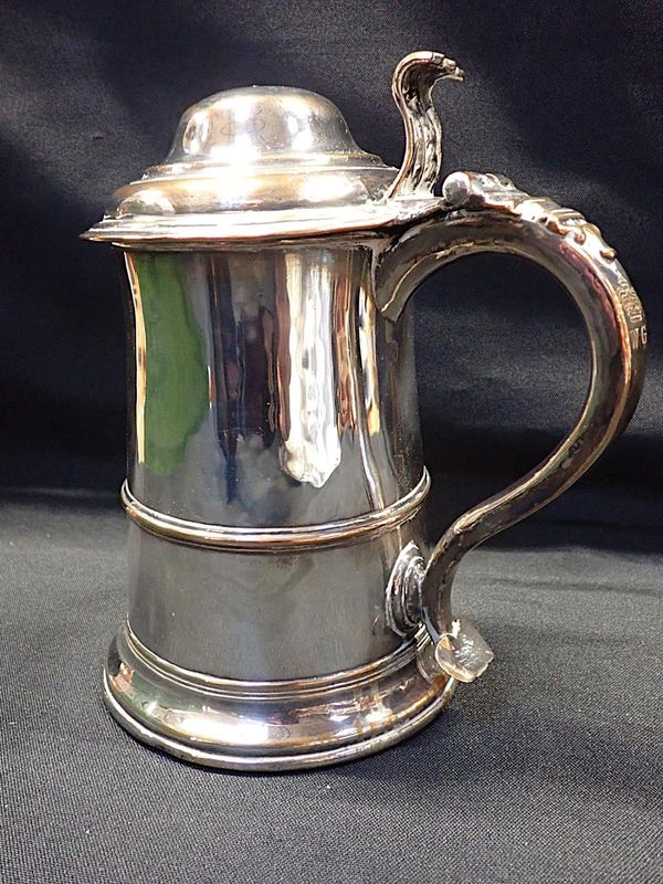 A 19th CENTURY SILVER-PLATED ON COPPER TANKARD