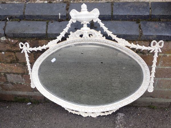AN ADAM STYLE OVAL WALL MIRROR