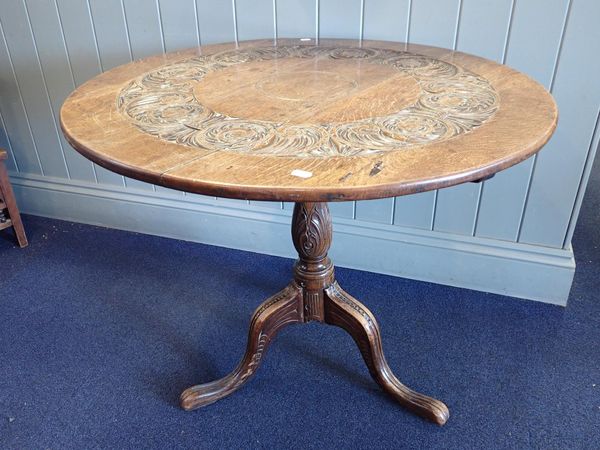 A GEORGE III OAK TRIPOD TABLE