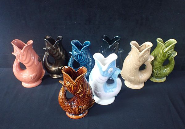 A COLLECTION OF DARTMOUTH GURGLE JUGS