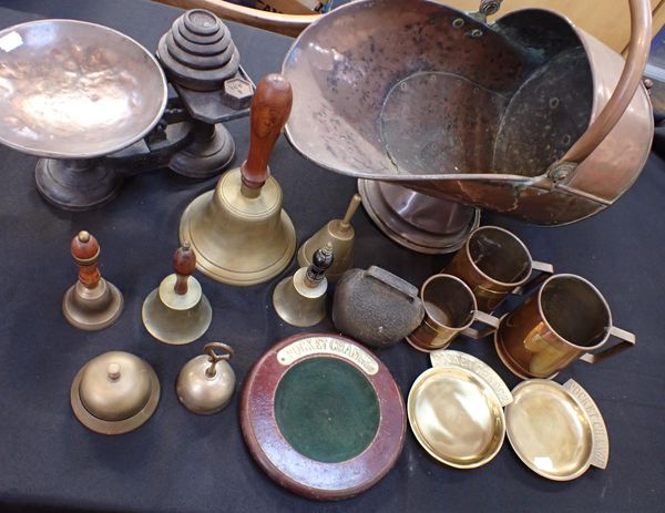 A COLLECTION OF BRASS HAND BELLS