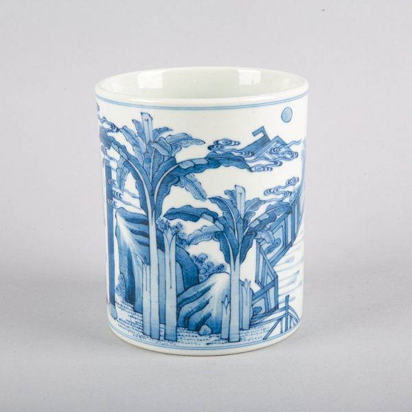 A CHINESE PORCELAIN BLUE AND WHITE BRUSH POT