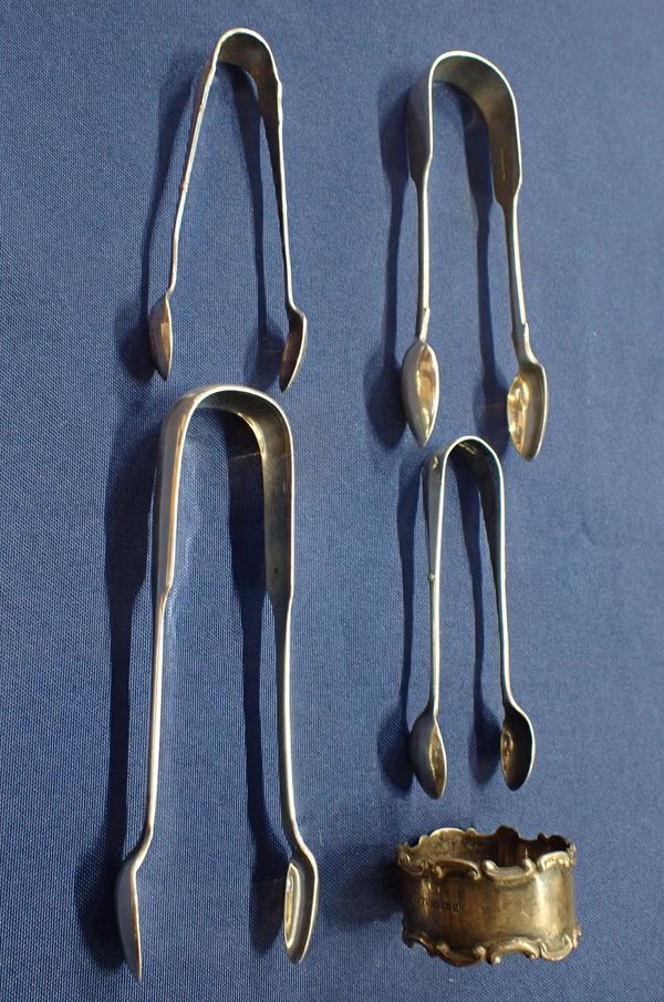 A COLLECTION OF SILVER SUGAR TONGS