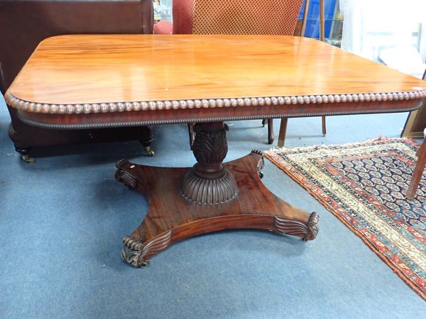 A REGENCY MAHOGANY BREAKFAST TABLE