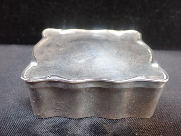 AN EDWARD VII SILVER DRESSING TABLE BOX