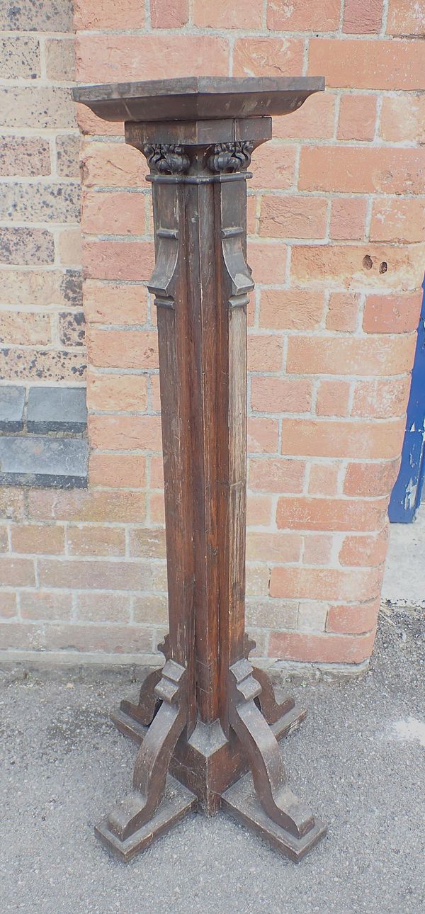 A VICTORIAN GOTHIC OAK STAND