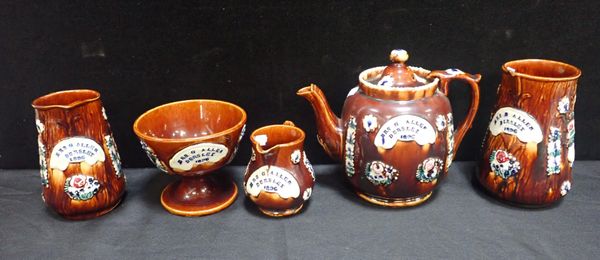 A LATE 19th CENTURY MEASHAM WARE TEAPOT, MILK JUG AND SUGAR BASIN