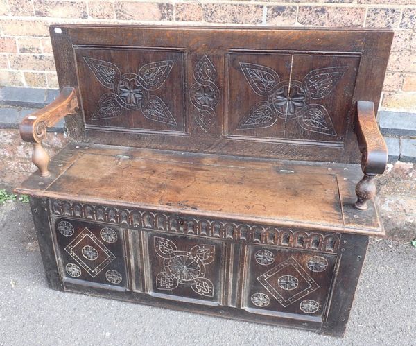 AN OAK HALL BENCH, 17th CENTURY AND LATER