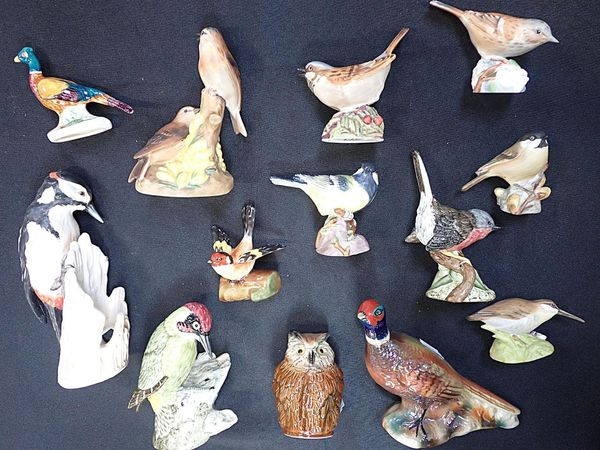 A COLLECTION OF CERAMIC BIRDS