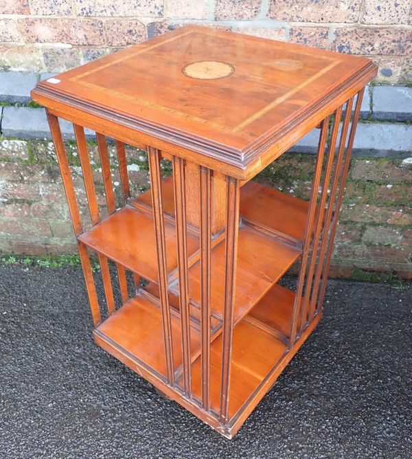 A YEW-WOOD REVOLVING BOOKCASE