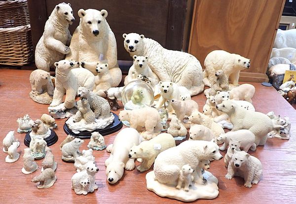 A LARGE COLLECTION OF RESIN CAST POLAR BEAR FIGURES