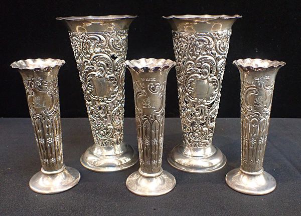 PAIR OF PIERCED SILVER VASES
