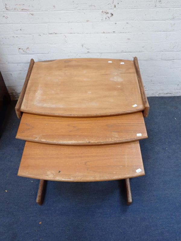 A MID-CENTURY MODERN TEAK NEST OF TABLES