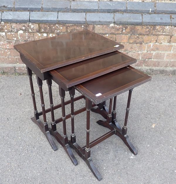 A MAHOGANY NEST OF THREE TABLES