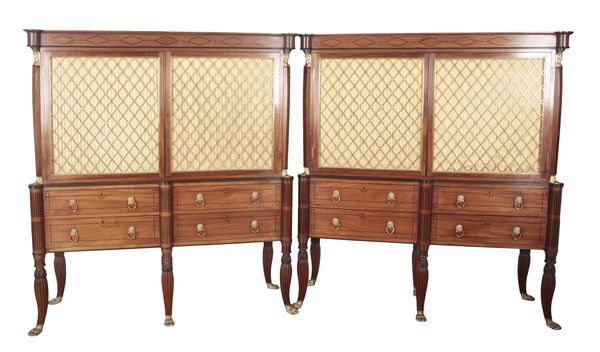 A PAIR OF REGENCY FIGURED MAHOGANY CABINETS OF EGYPTIAN REVIVAL DESIGN