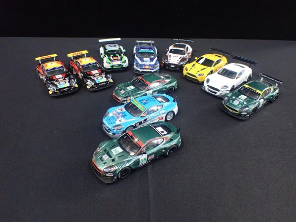 ELEVEN UNBOXED SCALEXTRIC 'ASTON MARTIN' RACE CARS