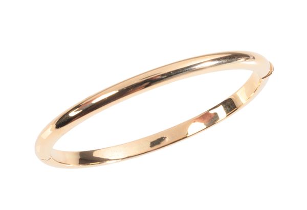CARTIER: A VINTAGE HINGED BANGLE