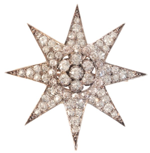 AN ANTIQUE DIAMOND STAR BROOCH / PENDANT